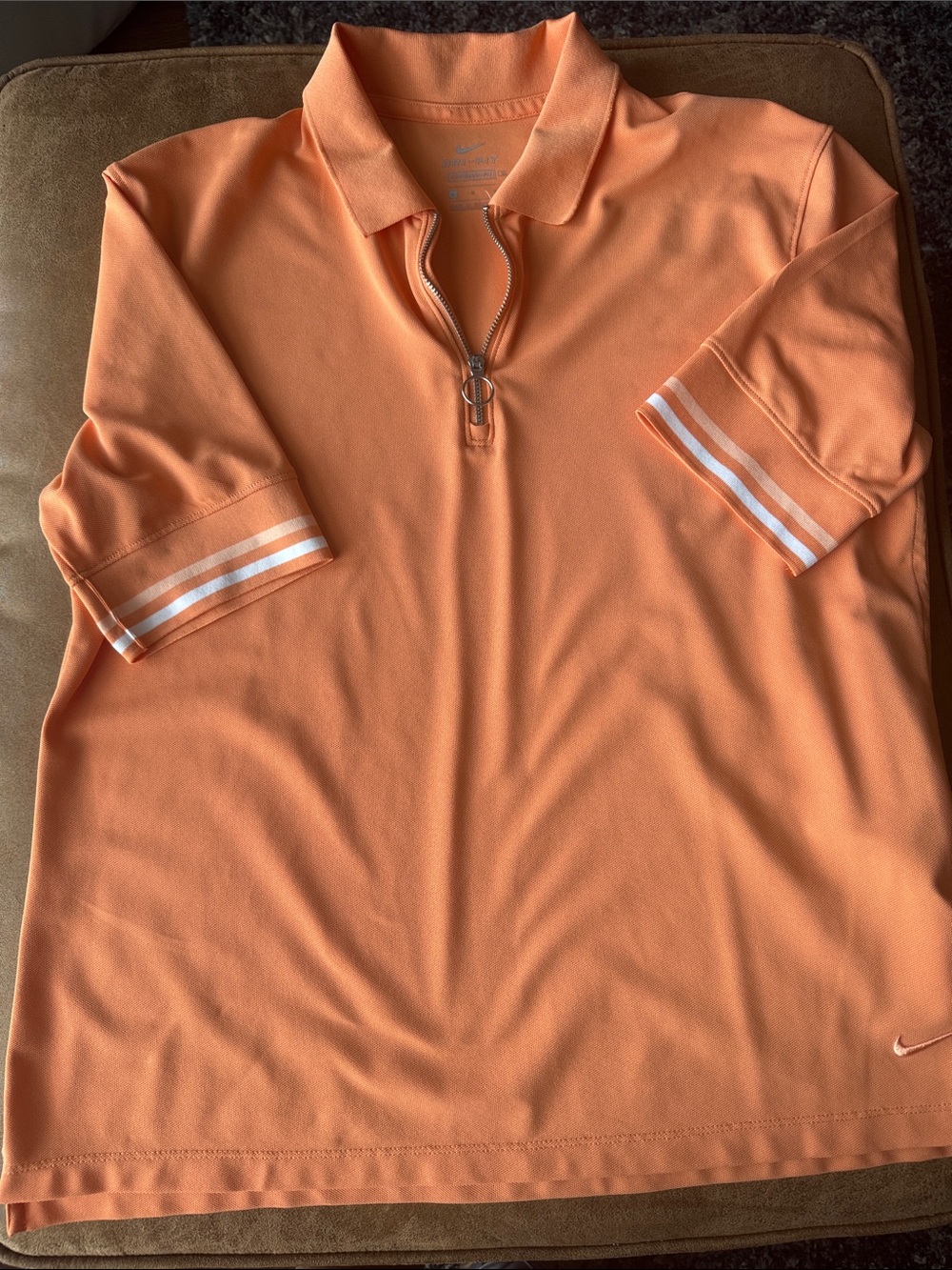 Nike Women’s orange Zip Polo with Striped Sleeve Detail